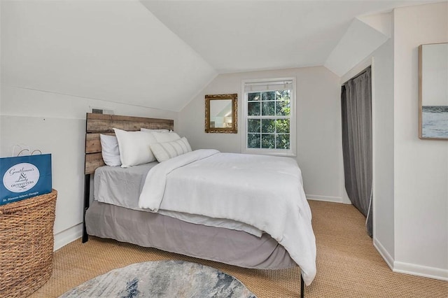 205 Palmetto St, Saint Simons Island, GA 31522 - bedroom with vaulted ceiling and carpet