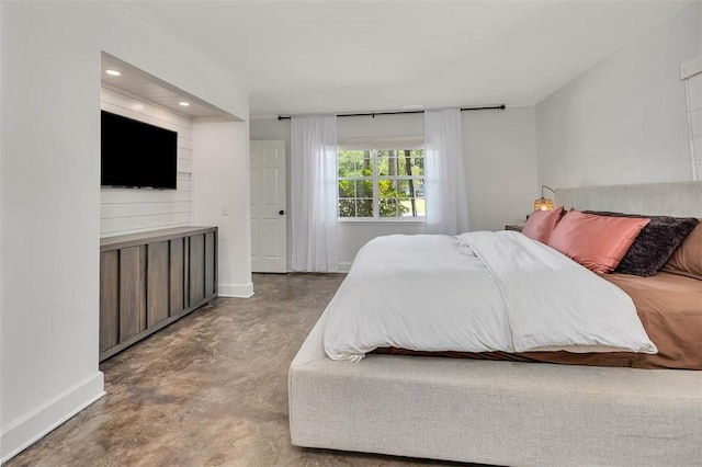 205 Palmetto St, Saint Simons Island, GA 31522 - bedroom featuring concrete flooring and recessed lighting