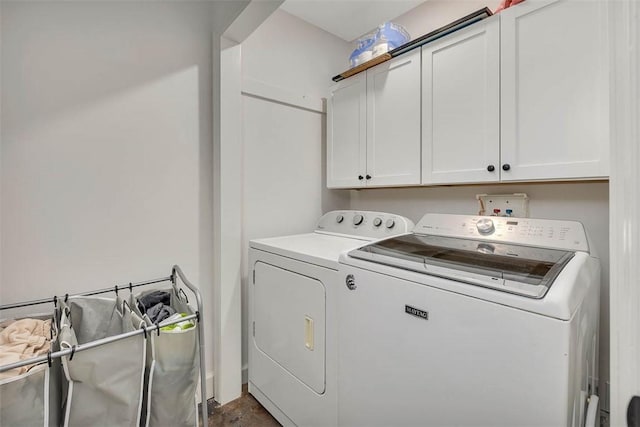 205 Palmetto St, Saint Simons Island, GA 31522 - laundry area featuring independent washer and dryer and cabinet space