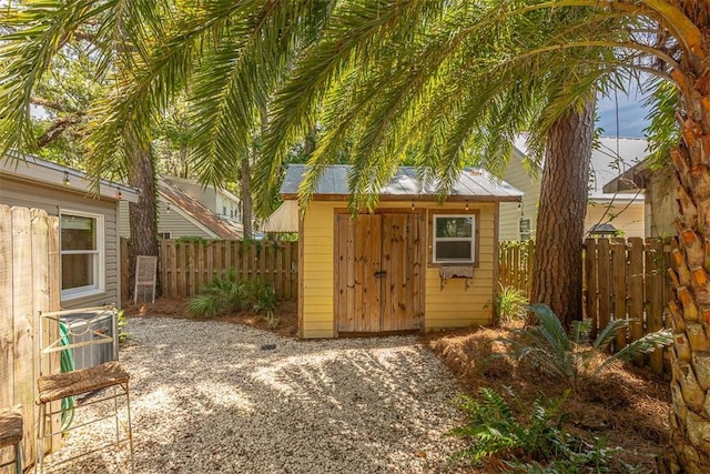 205 Palmetto St, Saint Simons Island, GA 31522 - view of shed with a fenced backyard