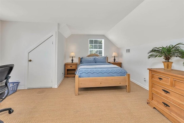 205 Palmetto St, Saint Simons Island, GA 31522 - bedroom with light carpet and lofted ceiling