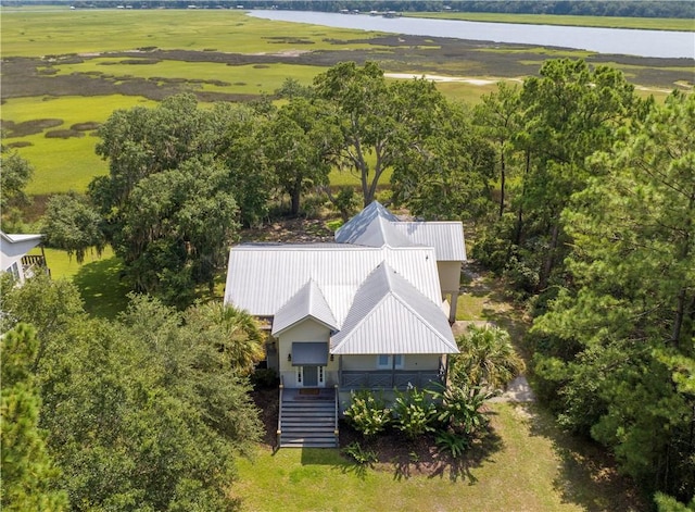 birds eye view of property with a rural view and a water view