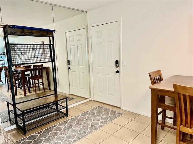 view of tiled foyer entrance