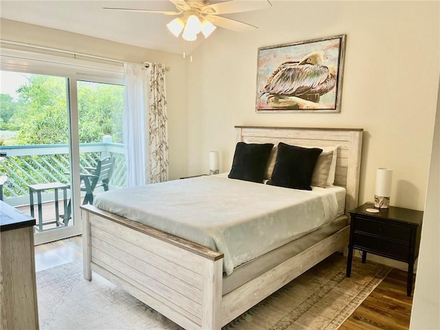 bedroom with access to outside, ceiling fan, and dark hardwood / wood-style floors