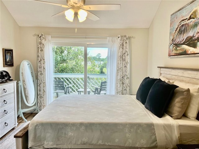 bedroom with access to exterior, ceiling fan, and hardwood / wood-style floors