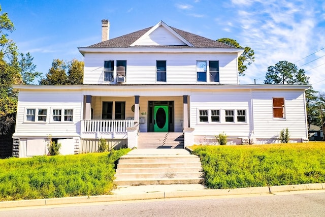415 Dewey St, Waycross, GA 31501 - view of front facade featuring a porch and a chimney