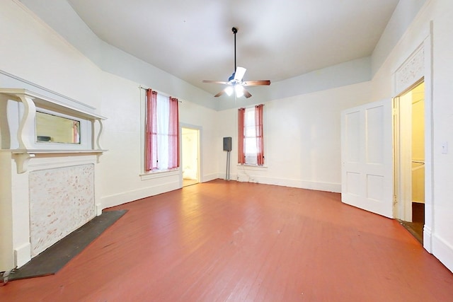 415 Dewey St, Waycross, GA 31501 - unfurnished living room featuring ceiling fan and wood finished floors