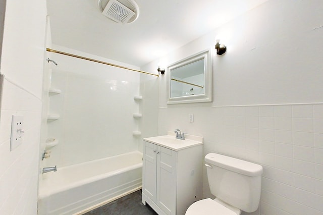 415 Dewey St, Waycross, GA 31501 - full bathroom with vanity, tub / shower combination, and tile walls