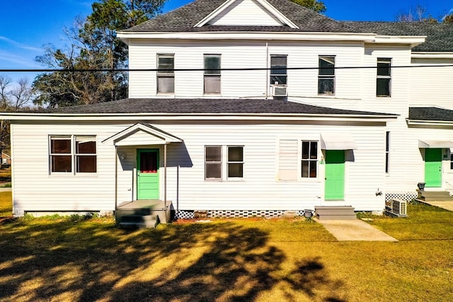 415 Dewey St, Waycross, GA 31501 - back of property featuring entry steps, a shingled roof, and a yard