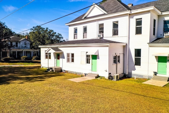 415 Dewey St, Waycross, GA 31501 - view of front of house featuring entry steps, a shingled roof, and a front lawn