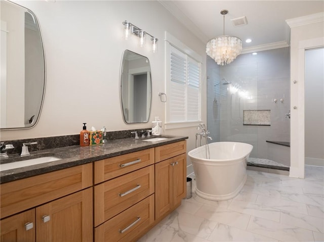 bathroom with plus walk in shower, a chandelier, crown molding, and vanity