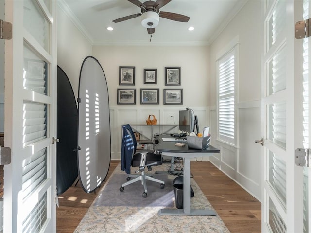 home office featuring ceiling fan, dark hardwood / wood-style flooring, and crown molding