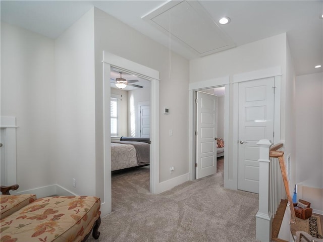 bedroom featuring light carpet and ceiling fan