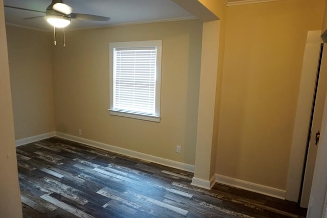 unfurnished room featuring ceiling fan, dark wood-type flooring, and ornamental molding