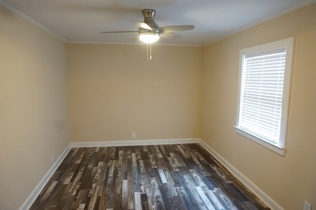 spare room with crown molding, ceiling fan, and dark hardwood / wood-style floors