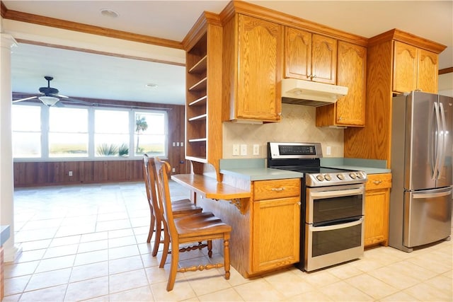 kitchen featuring appliances with stainless steel finishes, backsplash, ornamental molding, ceiling fan, and light tile patterned floors