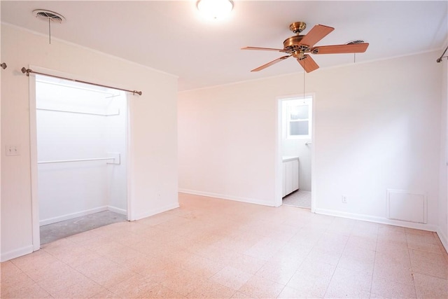 spare room featuring ceiling fan