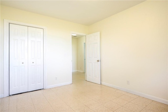 unfurnished bedroom featuring a closet