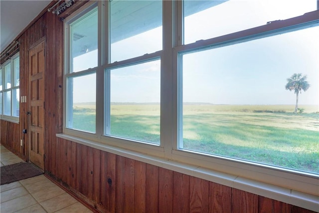 interior details with a rural view and wooden walls