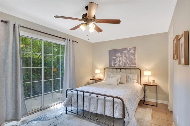 bedroom with access to exterior, ceiling fan, and light tile patterned flooring