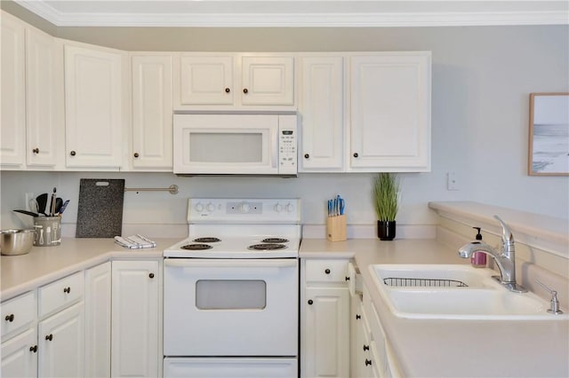 kitchen featuring crown molding, sink, white cabinets, and white appliances