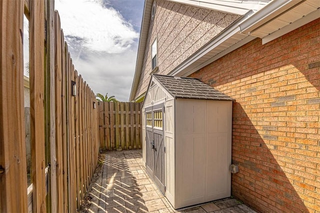 257 Villager Dr, Saint Simons Island, GA 31522 - view of side of home featuring brick siding