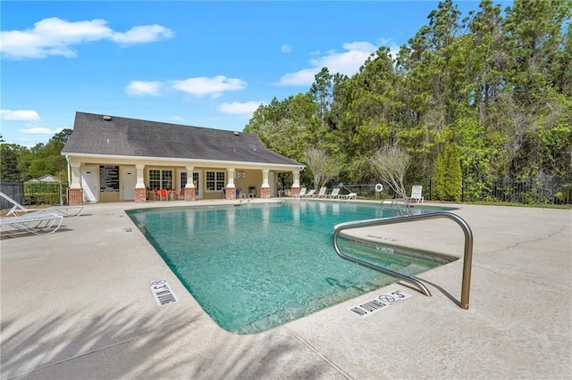 view of swimming pool featuring a patio