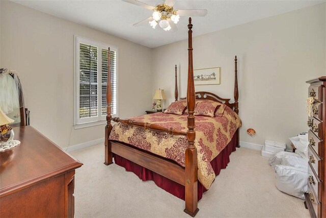 1064 Sea Palms W Dr, Saint Simons Island, GA 31522 - bedroom featuring light carpet and ceiling fan