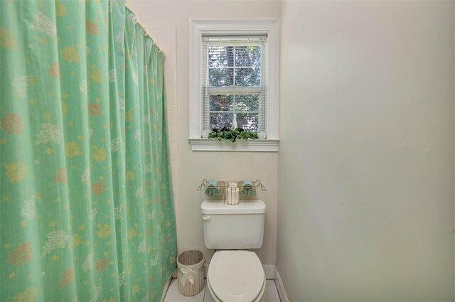 1064 Sea Palms W Dr, Saint Simons Island, GA 31522 - full bathroom featuring toilet and a shower with shower curtain