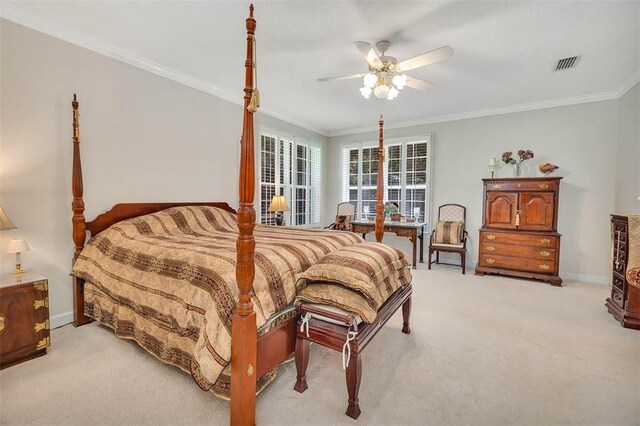 1064 Sea Palms W Dr, Saint Simons Island, GA 31522 - bedroom with crown molding, light colored carpet, and ceiling fan