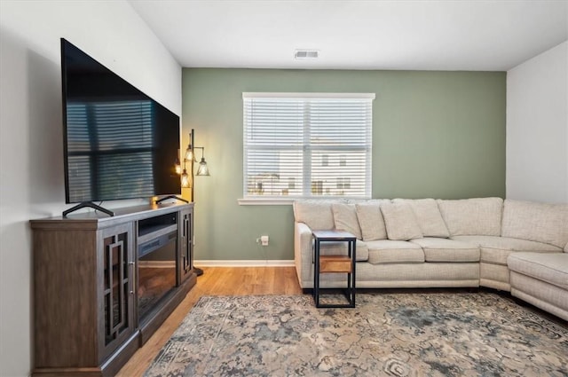 living room featuring light hardwood / wood-style floors