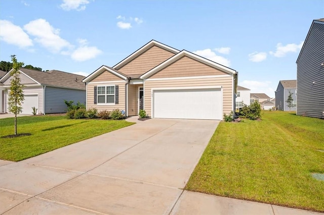 view of front facade with a garage and a front yard