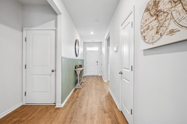 hallway with light wood-type flooring