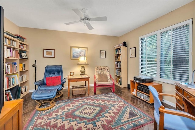899 Wimbledon Dr, Saint Simons Island, GA 31522 - living area featuring an office area, a ceiling fan, and baseboards