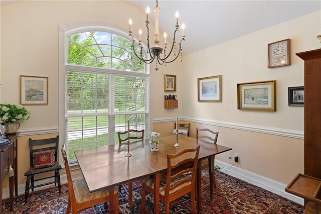 117 Serenoa Dr, Brunswick, GA 31523 - dining area with a chandelier and baseboards