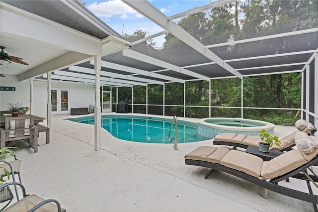 117 Serenoa Dr, Brunswick, GA 31523 - view of swimming pool featuring french doors, a patio, ceiling fan, a pool with connected hot tub, and a lanai