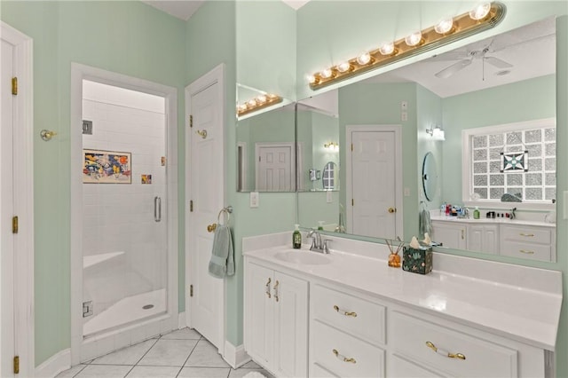 117 Serenoa Dr, Brunswick, GA 31523 - bathroom with a stall shower, vanity, tile patterned floors, and ceiling fan