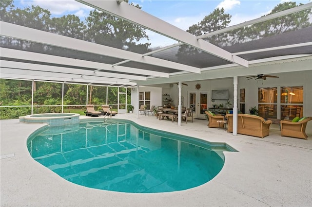 117 Serenoa Dr, Brunswick, GA 31523 - view of swimming pool with french doors, ceiling fan, a patio area, outdoor lounge area, and a lanai