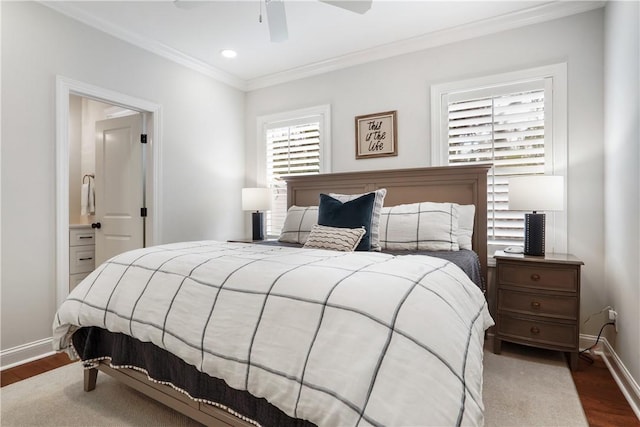 bedroom with ceiling fan, crown molding, baseboards, and wood finished floors