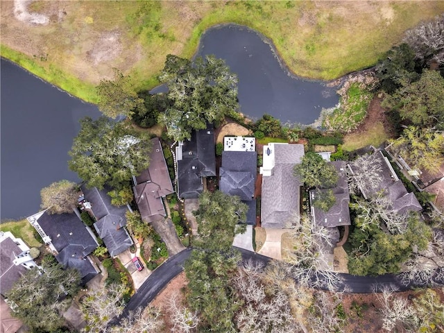 birds eye view of property featuring a water view