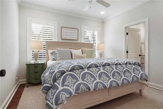 bedroom with a ceiling fan, baseboards, and ornamental molding