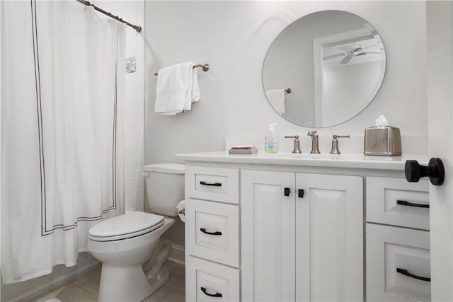 full bath with vanity, toilet, and tile patterned flooring