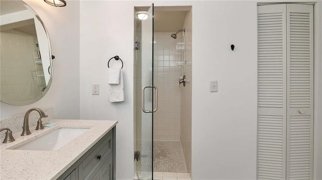 bathroom featuring vanity and walk in shower