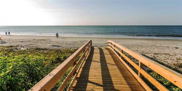 view of water feature with a beach view