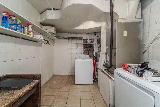 1007 Atlantic Ave, Waycross, GA 31501 - basement featuring washer / clothes dryer and light tile patterned floors