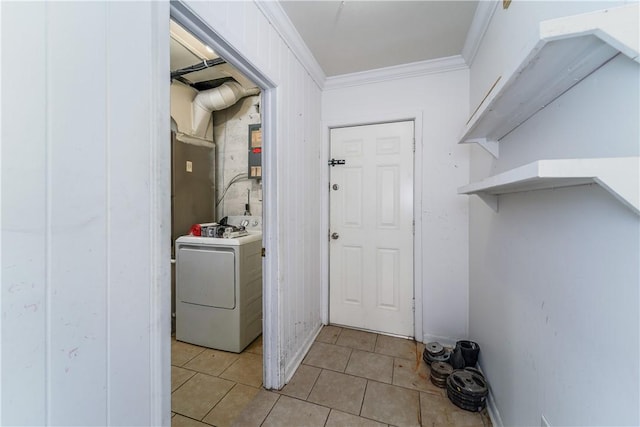 1007 Atlantic Ave, Waycross, GA 31501 - laundry area with washer / dryer, light tile patterned flooring, and ornamental molding