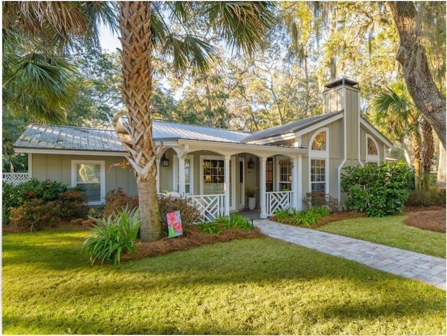 ranch-style home with a front lawn