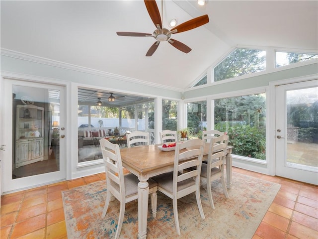 sunroom featuring ceiling fan and vaulted ceiling