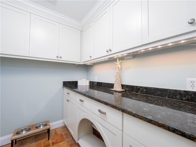 washroom featuring cabinets