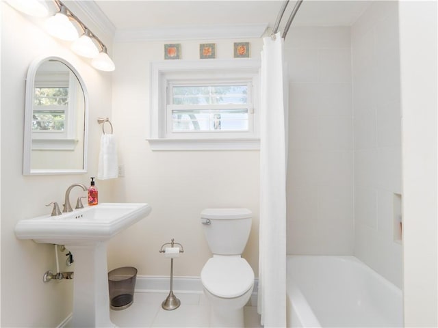 full bathroom featuring ornamental molding, sink, shower / tub combo, and toilet